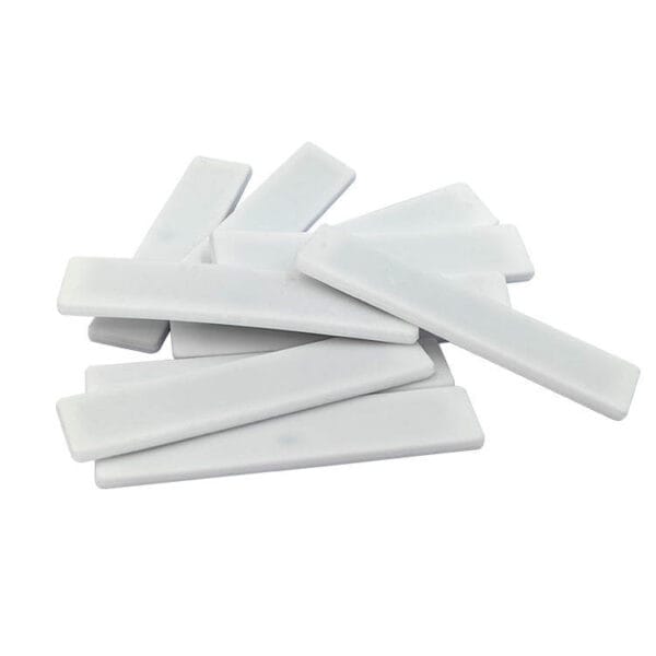 Etiquette de blanchisserie en silicone souple pour textiles commerciaux