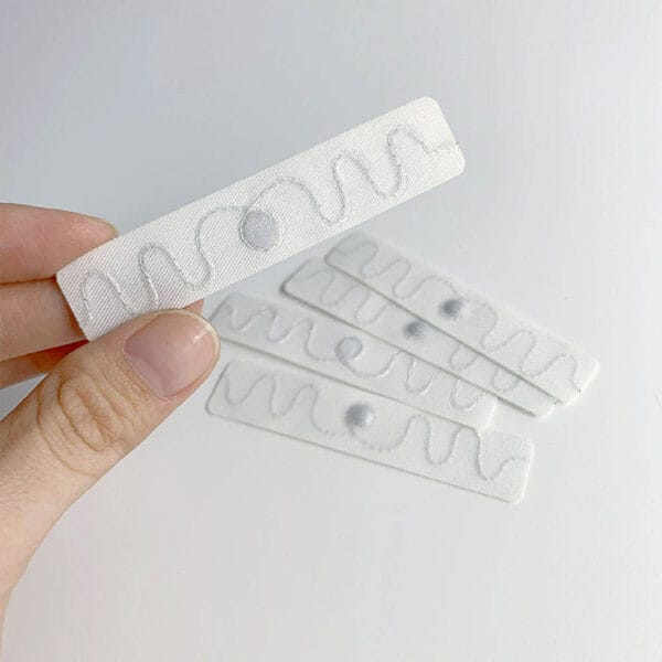 Etiquette RFID HF UHF lavable pour les blanchisseries commerciales
